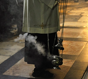 Israel. Jerusalem. Priest uses incense Israel. Jerusalem. Priest uses incense