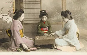 Three Japanese Geisha girls playing Go Three Japanese Geisha girls playing Go