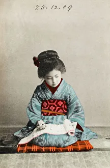 Japanese girl practising calligraphy Japanese girl practising calligraphy