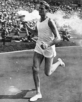 Wembley Arena Events Prints: John Mark carrying the Olympic torch, opening ceremony, 1948