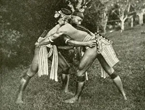 Two Kayan wrestlers of Borneo, SE Asia Two Kayan wrestlers of Borneo, SE Asia