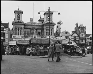 Prints of The Market Place, Kingston- upon-Thames, Surrey, England, on a busy market day Kingston Upon Thames Prints: Kingston-Upon-Thames Market Place Print