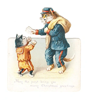 Kitten with cat postman on a cutout Christmas card Kitten with cat postman on a cutout Christmas card