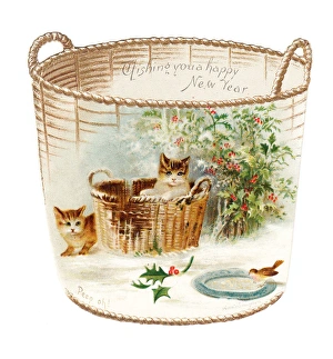 Two kittens and a bird on a cutout New Year card Two kittens and a bird on a cutout New Year card
