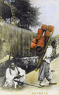 A Korean terracotta jar/pot seller and his seated chum A Korean terracotta jar/pot seller and his seated chum