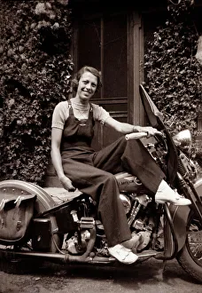 Lady on a 1939/40 Harley Davidson motorcycle Lady on a 1939/40 Harley Davidson motorcycle