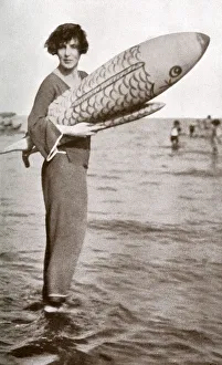 Lady Diana Cooper at Venice Lido with inflatable fish Lady Diana Cooper at Venice Lido with inflatable fish