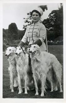 Lady in elaborate costume with three Borzois Lady in elaborate costume with three Borzois