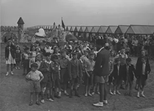 A large group of children at Butlin's are entertained by a single male Redcoat A large group of children at Butlin's are entertained by a single male Redcoat