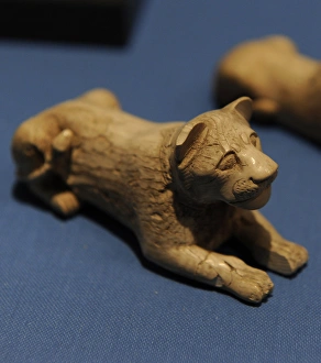 Lion-shaped piece of game. Ivory. From a tomb in Abydos. Ear Lion-shaped piece of game. Ivory. From a tomb in Abydos. Ear