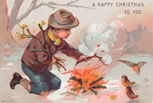 Little boy making fire on a Christmas card Little boy making fire on a Christmas card