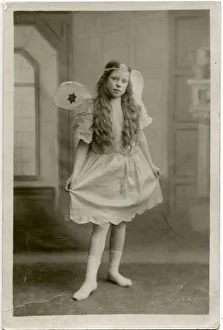 A little girl called Maggie in fancy dress, wearing a fairy costume on Pancake Tuesday A little girl called Maggie in fancy dress, wearing a fairy costume on Pancake Tuesday