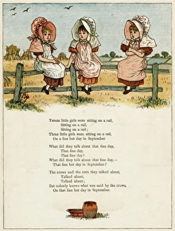 Three little girls sitting on a fence Three little girls sitting on a fence