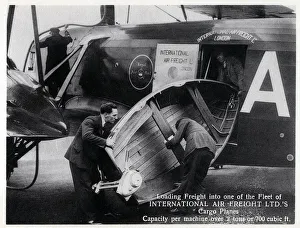 Loading freight into one of the Fleet of International Air Freight Ltd.' Loading freight into one of the Fleet of International Air Freight Ltd.'