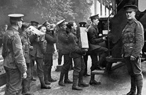 WWI Military Vehicles Prints: Loading motor buses with ammunition, WW1