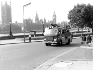 Prints of Lambeth fire stations pump-escape pictured on Lambeth Palace Road, SE1, in September 1966, with the Houses of Parliament in the background Fire Brigade Prints: London Fire Brigade Pump Escape Print, 1966
