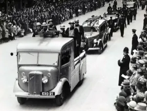 Prints of London firefighters and Auxiliary firefighters with appliances taking part in the annual Lord Mayors Show through the City of London. A Bedford heavy pump unit with crew leads the LFB contingent Event Prints: London Fire Brigade in Lord Mayors Show Print