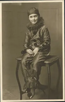 Lovely photograph of a little boy in a pierrot costume. Date: 1920s Lovely photograph of a little boy in a pierrot costume. Date: 1920s