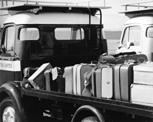 Luggage on a truck at Jersey Airport, Channel Islands Luggage on a truck at Jersey Airport, Channel Islands