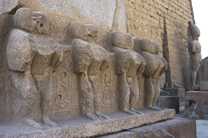 Luxor temple. Mandrill carved into the base of the obelisk o Luxor temple. Mandrill carved into the base of the obelisk o