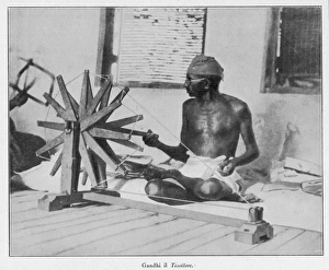 Mahatma Gandhi spinning at his wheel Mahatma Gandhi spinning at his wheel
