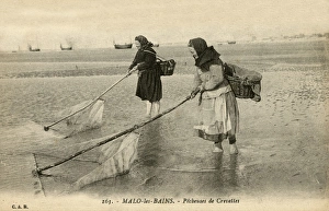 Malo-les-Bains, France - women fishing for shrimp Malo-les-Bains, France - women fishing for shrimp
