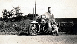 Man on his 1937 Ariel Square Four motorcycle Man on his 1937 Ariel Square Four motorcycle