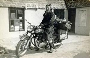 Man on his 1956/7 Royal Enfield motorcycle Man on his 1956/7 Royal Enfield motorcycle
