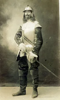 A man dressed in authentic English Civil War costume. Date: c.1910 A man dressed in authentic English Civil War costume. Date: c.1910