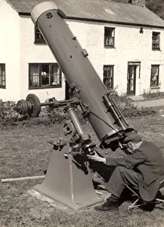 Man With Telescope Prints: Man with large telescope