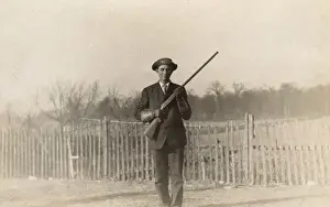 Man Posing with Rifle, circa 1910 Print