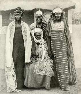 Man with two wives, Lokoja, Nigeria, West Africa Man with two wives, Lokoja, Nigeria, West Africa