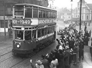 Prints of Manchesters last tram on its farewell journey, heading for the Depot. A group of people wave from the pavement. Date: 1949 Manchester Prints: Manchester's Last Tram Print: 1949 Farewell Journey