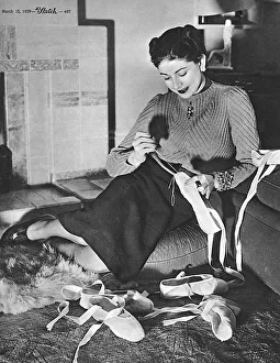 Margot Fonteyn repairing her ballet shoes Margot Fonteyn repairing her ballet shoes