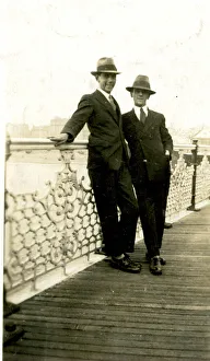 Two men on Brighton Pier, Brighton, East Sussex Two men on Brighton Pier, Brighton, East Sussex