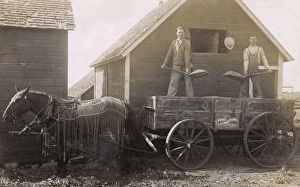 Men on New Stoughton Wagon, Iowa, USA Men on New Stoughton Wagon, Iowa, USA