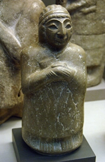 Mesopotamia. Limestone statue of a woman. Kingdom of Lagash Mesopotamia. Limestone statue of a woman. Kingdom of Lagash