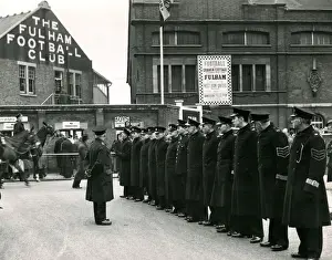 Prints of Officers of the Metropolitan Police B Division on duty for a football match between Fulham FC and West Ham United FC Reserves, competing for the Combination Cup Police Prints: Metropolitan Police B Division Print, Craven Cottage 1950s