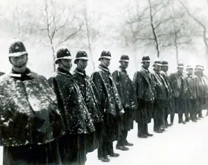 Prints of A group of Metropolitan Police Officers stand in a line in the snow Police Prints: Metropolitan Police Officers in Snow Print