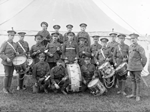 Military band with instruments in front of a tent Military band with instruments in front of a tent