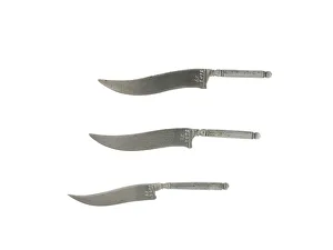 One of three miniature metal Sikh kirpan daggers One of three miniature metal Sikh kirpan daggers