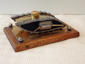 Model of a Great War British tank on a wooden oak plinth Model of a Great War British tank on a wooden oak plinth