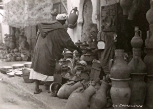 Morocco, North West Africa - Pot seller, Casablanca Morocco, North West Africa - Pot seller, Casablanca