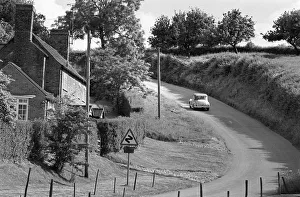 Morris Minor car on Wainlode Hill near the Red Lion Inn, Glo Morris Minor car on Wainlode Hill near the Red Lion Inn, Glo