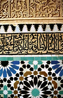 Mosaic with arab and kufic caligraphy (top) on a wall of the Mosaic with arab and kufic caligraphy (top) on a wall of the