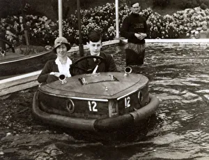 Mother and son riding a Rytecraft Scoota-boat - Llandudno Mother and son riding a Rytecraft Scoota-boat - Llandudno