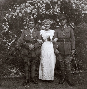 Mother and two sons in a garden, WW1 Mother and two sons in a garden, WW1
