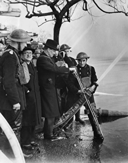 Mr Attlee attending hosepipe tests at Wimbledon, WW2 Mr Attlee attending hosepipe tests at Wimbledon, WW2