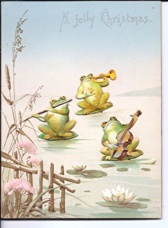 Three musical frogs on a movable Christmas card Three musical frogs on a movable Christmas card