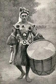 Musician with large drum, Tahiti, French Polynesia Musician with large drum, Tahiti, French Polynesia
